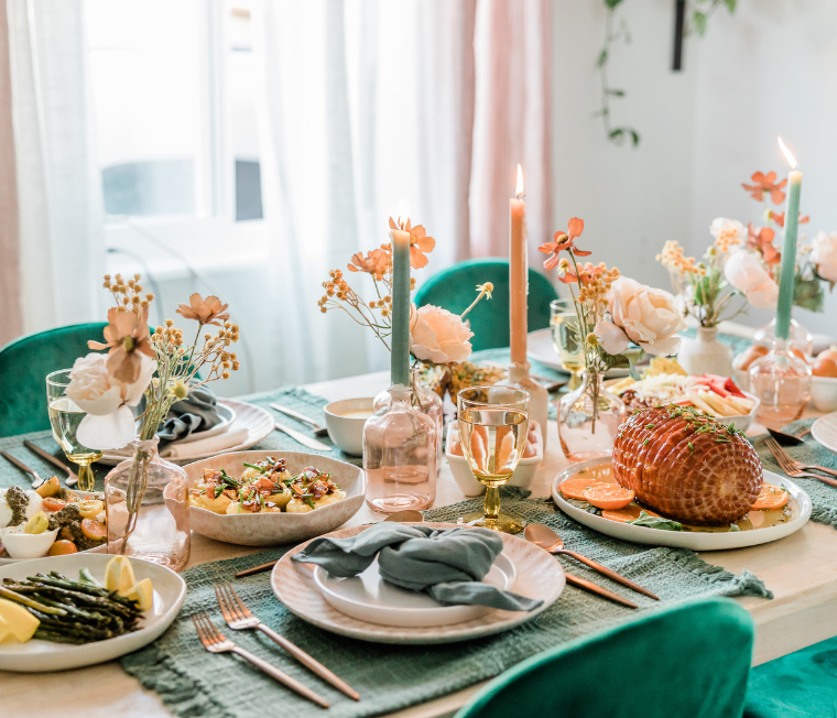 Dinner table with food and place settings