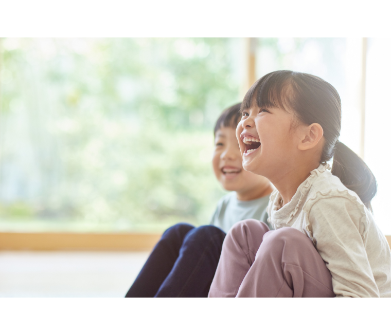 Two children laughing
