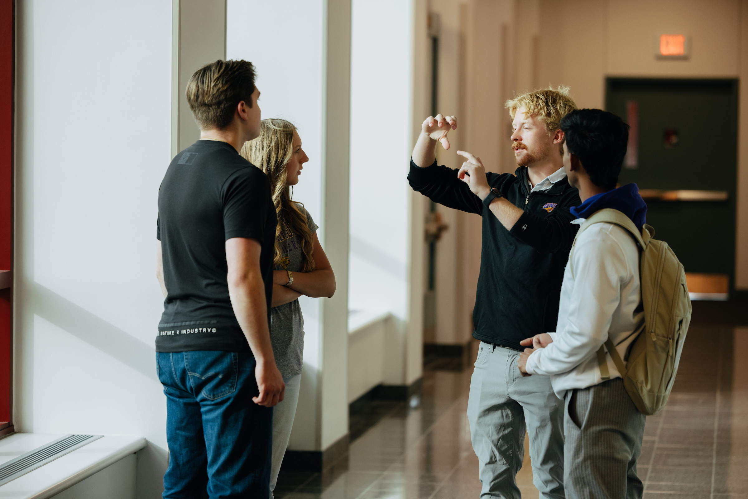 Group of students in Curris Business Building.