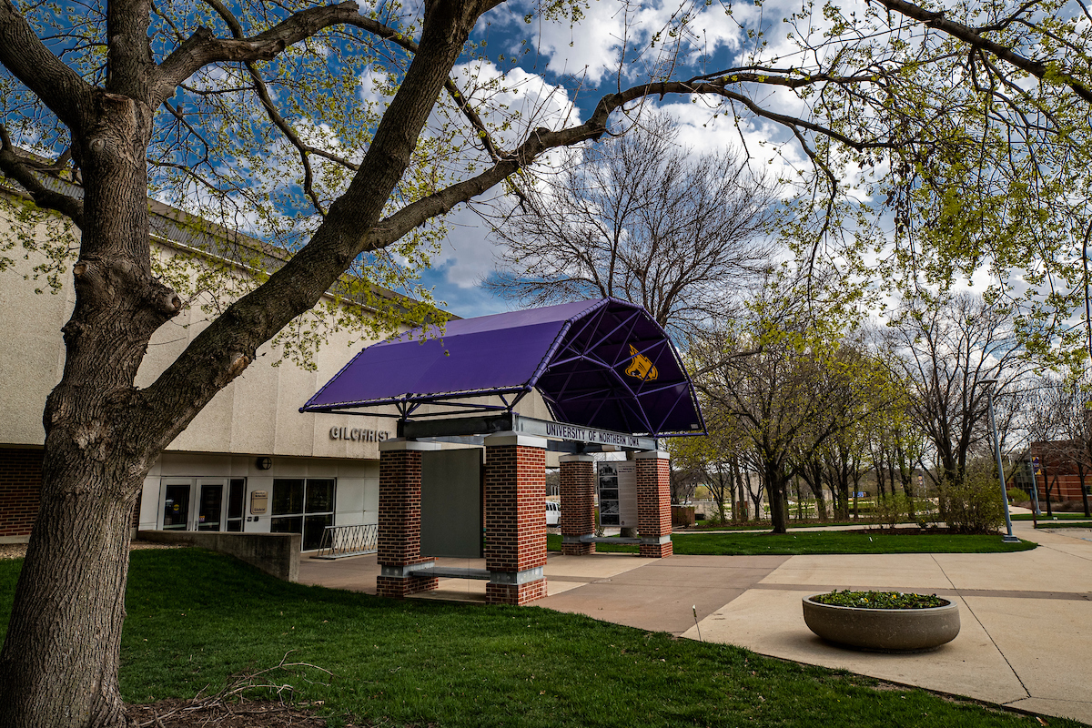 Springtime and the front entrance of Gilchrist Hall